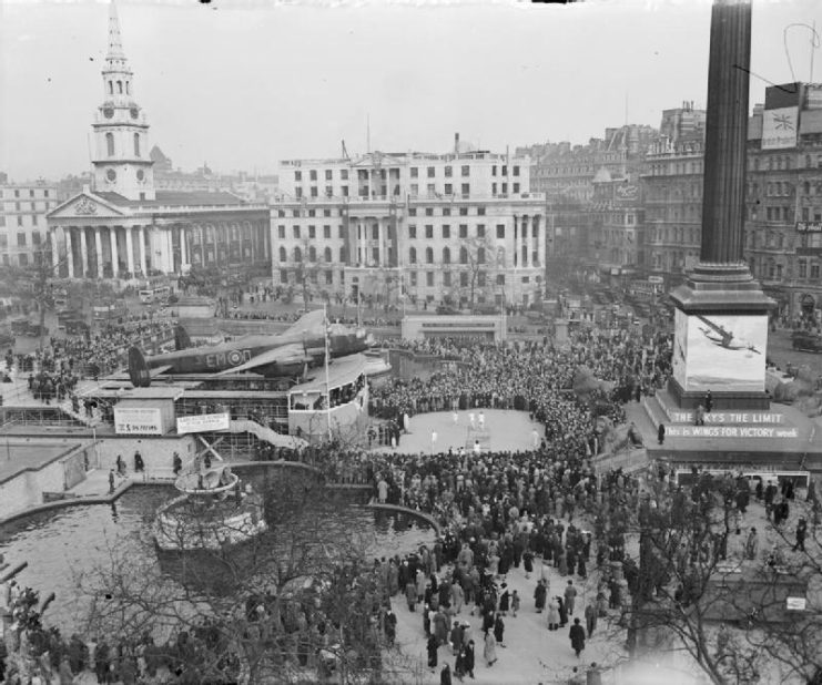 Avro Lancaster B Mark I, ‘O for Orange’ (L7580 ‘EM-O’) of No 207 Squadron, Royal Air Force, attracts the attention of crowds while on display in Trafalgar Square.