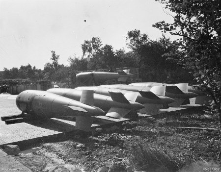 Five Tallboy bombs in a bomb dump at Bardney, Lincolnshire prior to being loaded on No. 9 Squadron RAF aircraft.