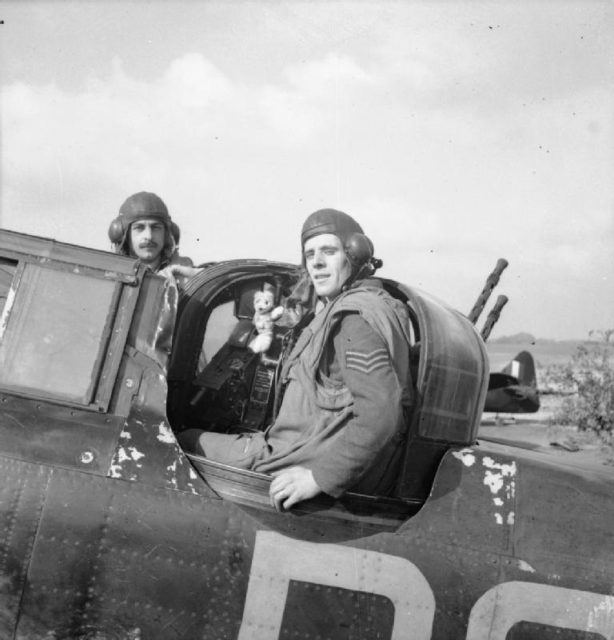 Flight Sergeant E. R. Thorn (pilot, left) and Sergeant F. J. Barker (air gunner) pose with their Boulton Paul Defiant turret fighter at RAF Biggin Hill, Kent, after destroying their 13th Axis aircraft.