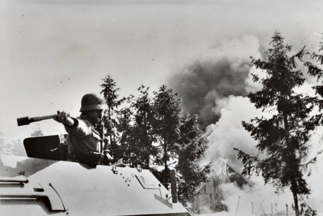 German soldier throwing Stg24 stick hand grenade. Bundesarchiv