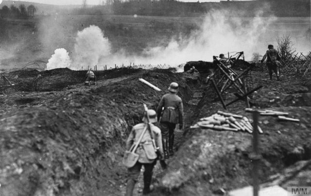 German stormtroopers practising the attack, supported by flamethrowers, near Sedan, May 1917 [© IWM (Q 88122)].