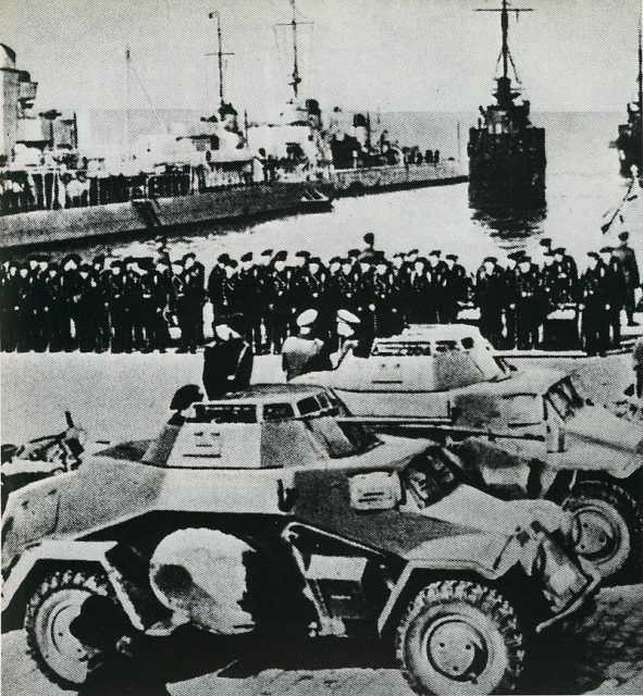 German troops and fleet in the newly joined to the Reich Memele, March 1939. In the foreground are German light armored cars Sd.Kfz.222