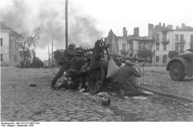 German troops engaging in street fighting in a Polish town. September 1939.