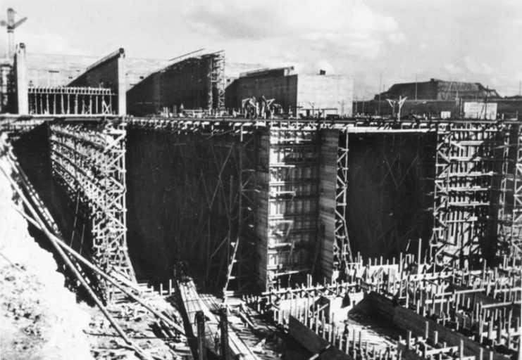 Original Caption – The giant bunkers on the Atlantic In a huge symphony of work, the giant bunkers were built on the Atlantic coast, providing our submarines with bomb-proof bases. October 1942