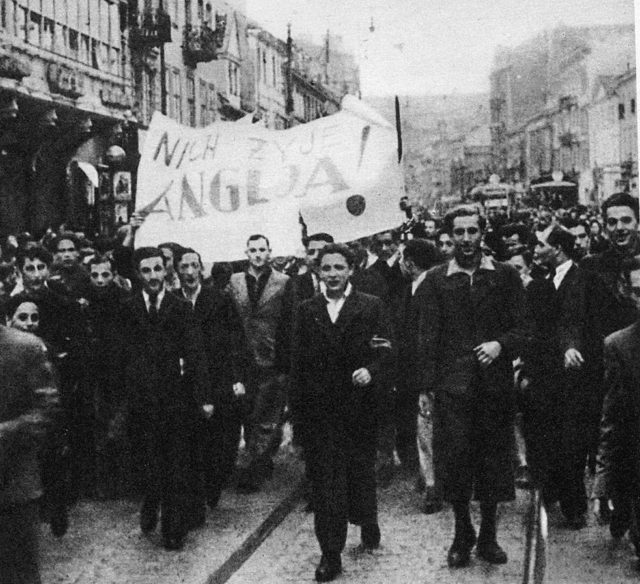 People of Warsaw in a happy demonstration under British Embassy just after British declaration of war with Nazi Germany. The sign says “Long live England!”