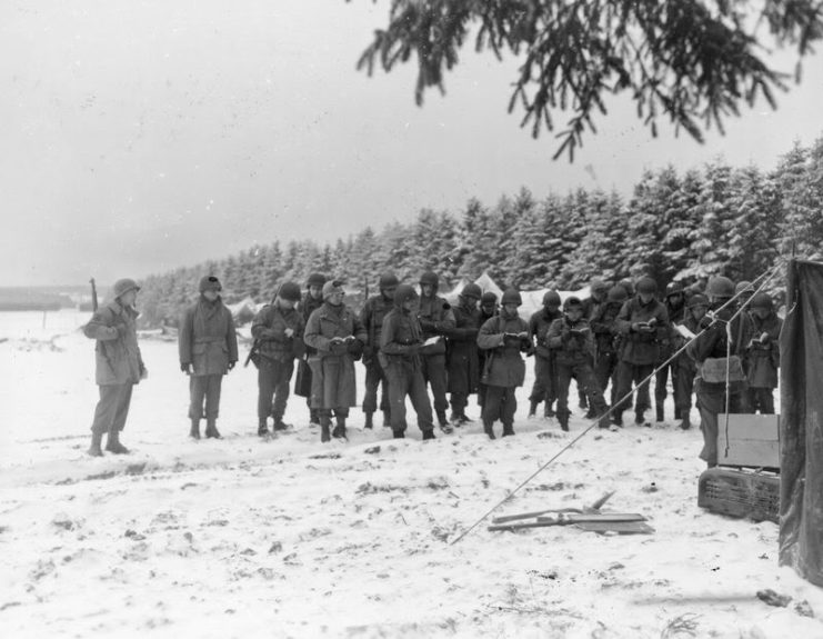Soldiers of the 99th Infantry Division attend a Christian service on New Years Eve.