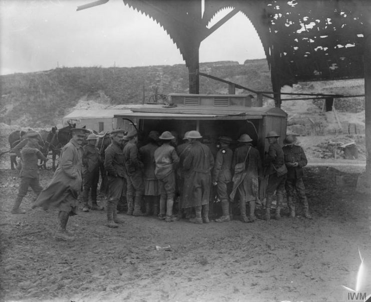 Soldiers surround a London coffee stall at Aveluy, November 1916.