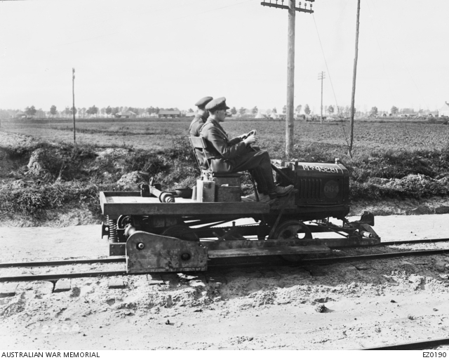 Two officers travelling on a T model Ford chassis 