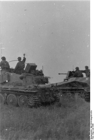 Waffen SS soldiers in their vehicle – By Bundesarchiv – CC BY-SA 3.0