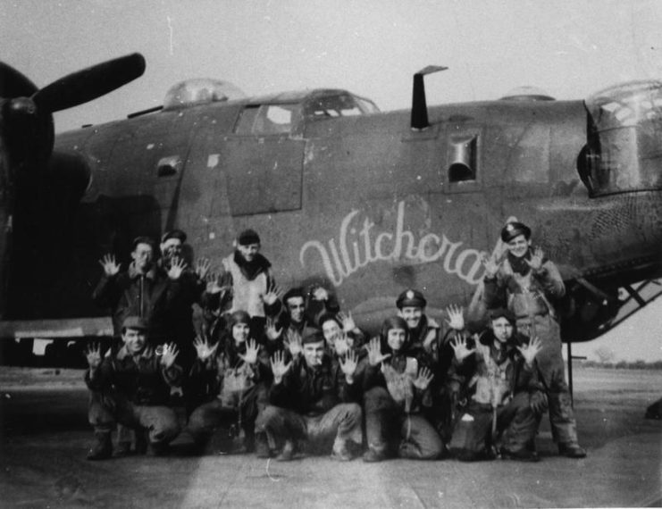 A bomber crew of the 467th Bomb Group with their B-24 Liberator (Q2-M_, serial number 42-52534) nicknamed Witchcraft.
