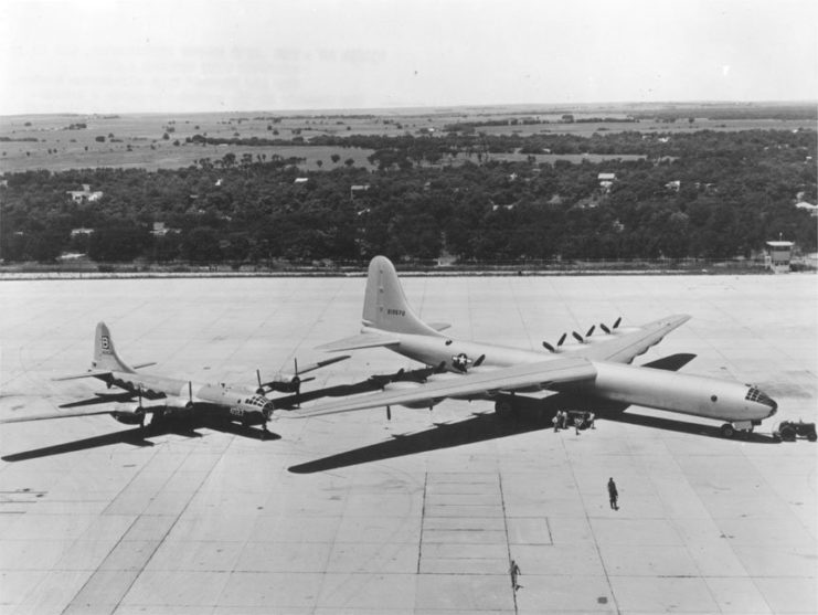 A U.S. Air Force Convair XB-36 parked beside a Boeing B-29 for a size comparison at Carswell Air Force Base, Ft. Worth, Texas.