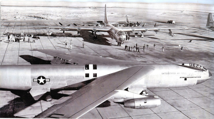 An XB-52, the prototype to the B-52. at Carswell AFB, 1955 shown with a 7th Bomb wing B-36