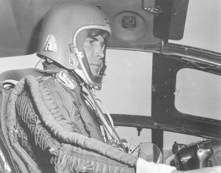 B-36 pilot wearing the tight-fitting high altitude suit and helmet, designed by the Air Force to protect its fliers from the low air pressures encountered at high altitudes.