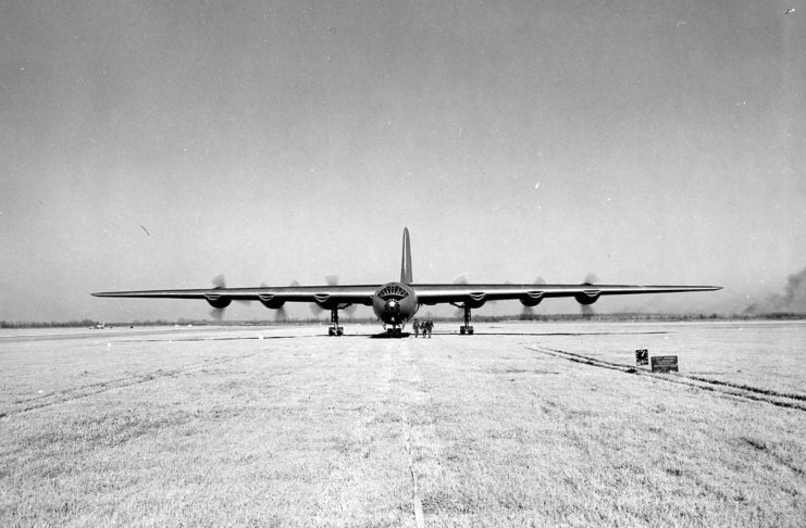 Convair XB-36 as it prepares for a taxi test through a grass field