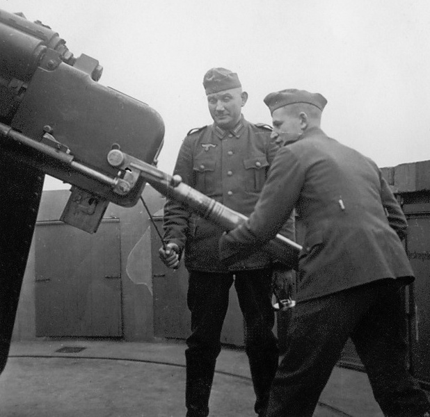 Loading a Flak gun on top of a tower