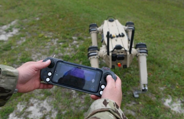 Master Sgt. Krystoffer Miller, 325th Security Forces Squadron operations support superintendent, operates a Quad-legged Unmanned Ground Vehicle at Tyndall Air Force Base, Florida.