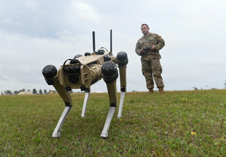 Master Sgt. Krystoffer Miller, 325th Security Forces Squadron operations support superintendent, with a Quad-legged Unmanned Ground Vehicle at Tyndall Air Force Base, Fla., March 24, 2021. U.S. Air Force photo