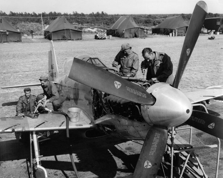 U.S. Air Force Maryland Air National Guard mechanics work on a North American P-51H-10-NA Mustang (s n 44-64505) assigned to the 104th Fighter-Bomber Squadron, 1954