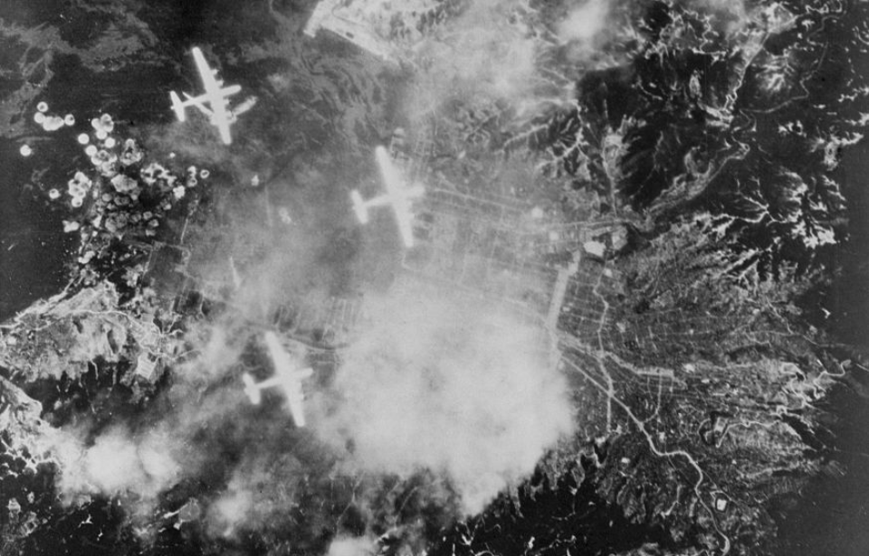 Three Boeing B-29 Superfortresses flying over Japan