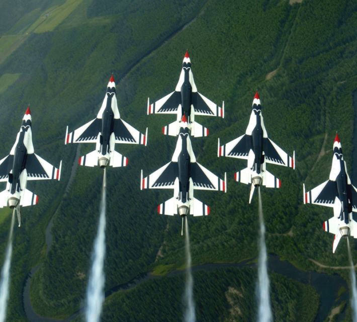 The Thunderbirds aerial demonstration team performs a loop while in the famous Delta formation 