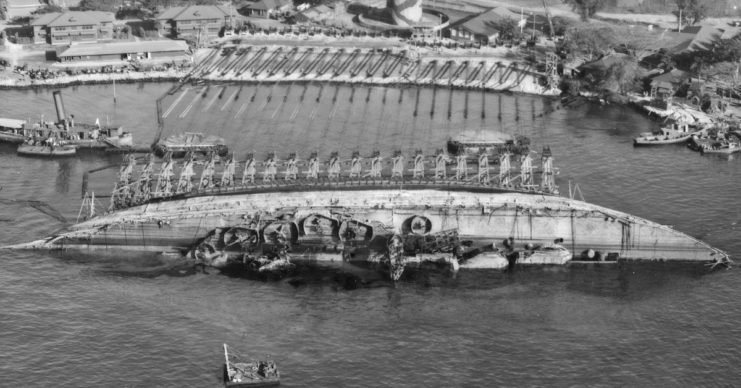 An aerial view of salvage operations on the USS Oklahoma.