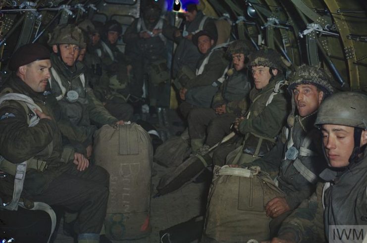 British paratroopers sitting in the fuselage of an aircraft while awaiting their order to jump.