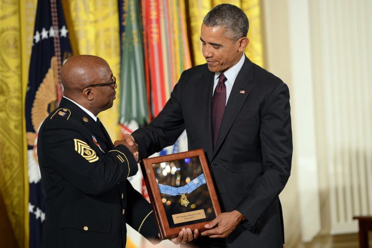 Barack Obama presenting Command Sgt. Maj. Louis Wilson with William Henry Johnson's Medal of Honor