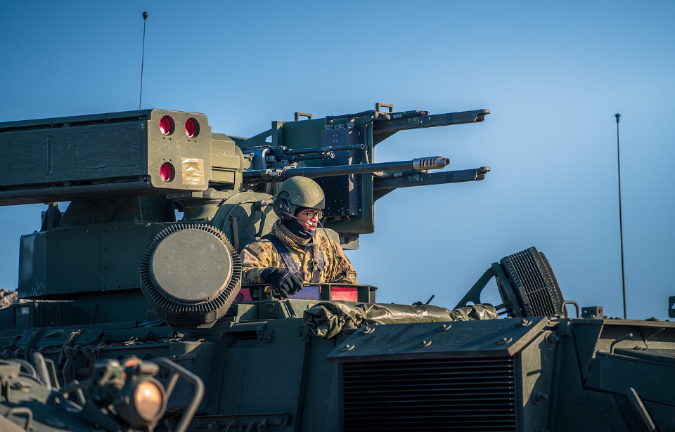 US Army soldier manning an M-SHORAD Stryker light armored vehicle
