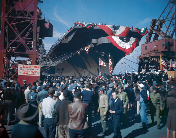 Crowd gathered around the USS Midway (CVB-41) at port