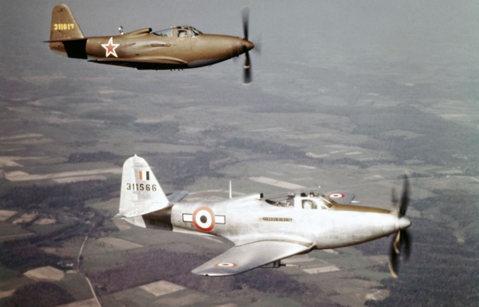 Two Bell P-39 Airacobras in flight