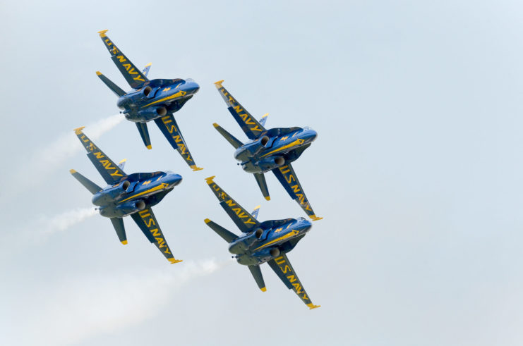 U.S. Navy flight demonstration squadron, the Blue Angels, Diamond Pilots perform the Diamond 360 maneuver during the Kansas City Aviation Expo and Air Show. 