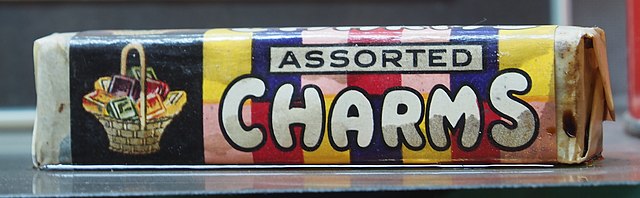 Package of Charms candy placed on a metal table