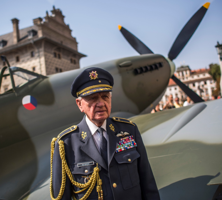 Former WWII spitfire RAF pilot Emil Bocek, aged 92, poses for photographers infront of a Mk. IX spitfire replica after the ceremony commemorating the 70th anniversary of the return home of the Czechoslovak airmen who fought with RAF from the United Kingdom on August 14, 2015 in Prague, Czech Republic.