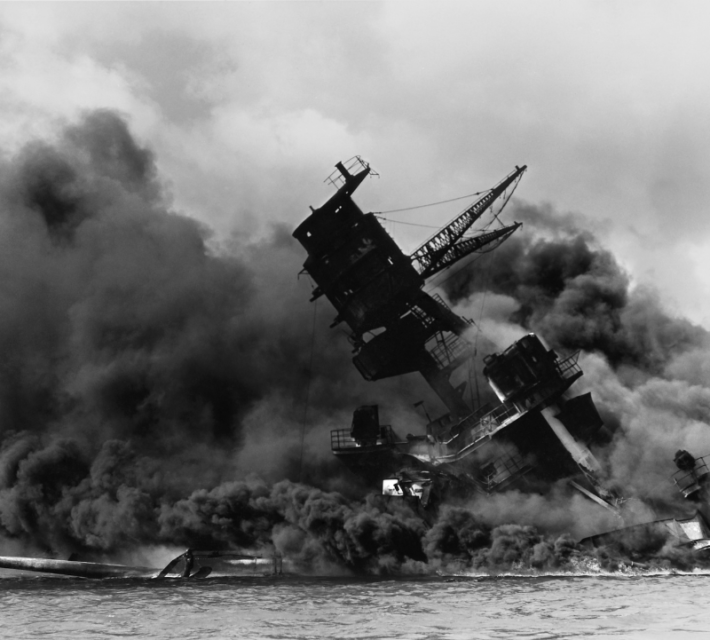 The USS Arizona (BB-39) burning after the Japanese attack on Pearl Harbor, 7 December 1941