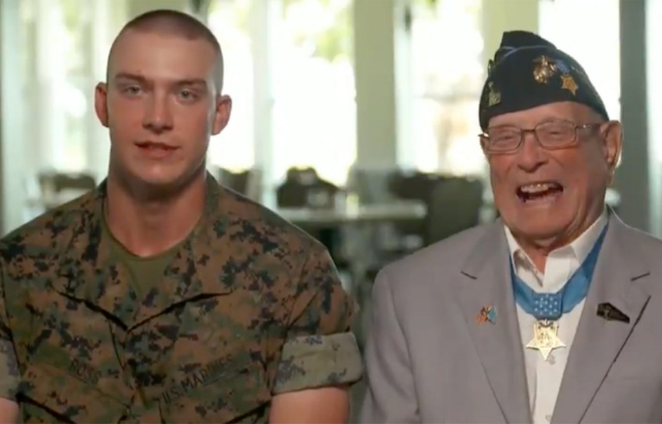 Hershel Williams and great-grandson Cedar Ross being interviewed by CBS