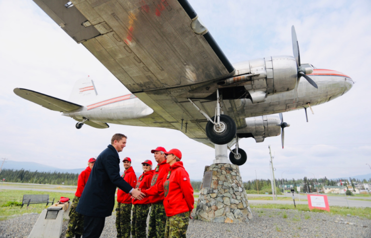 Former Canadian Prime Minister Andrew Scheer greets Canadian Rangers in the Yukon.