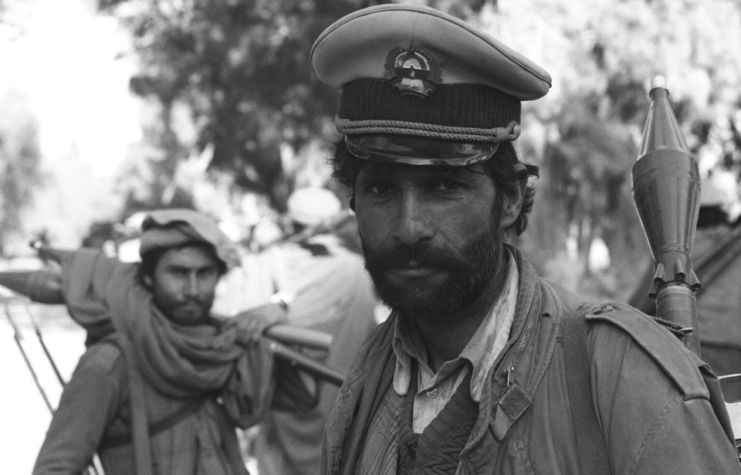 A member of an Afghan Mujahideen group wearing a Soviet military cap.