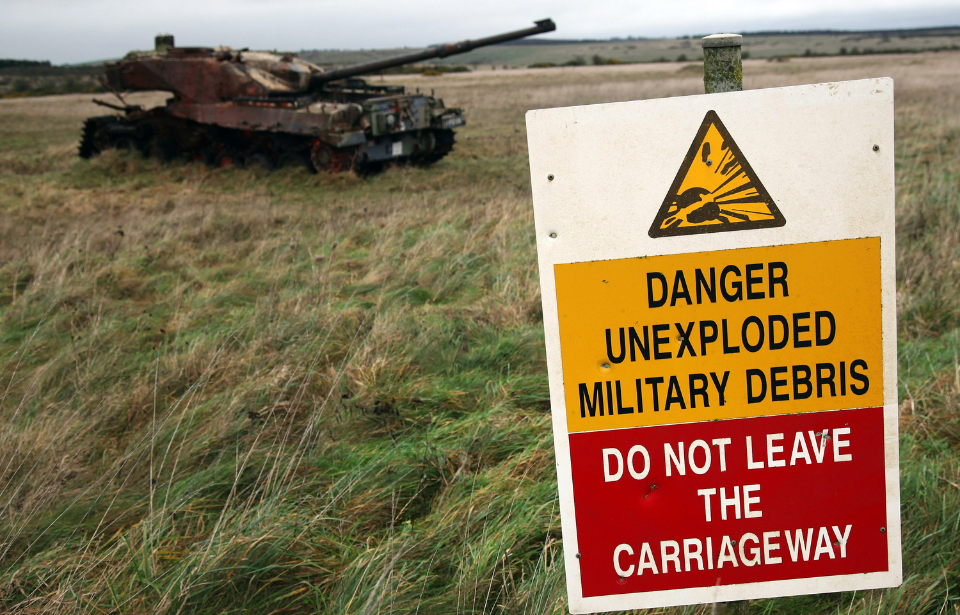 Wrecked tanks are seen close to the road that leads to the village of Imber on December 31, 2011 on Salisbury Plain, England. (Photo Credit: Matt Cardy/Getty Images)