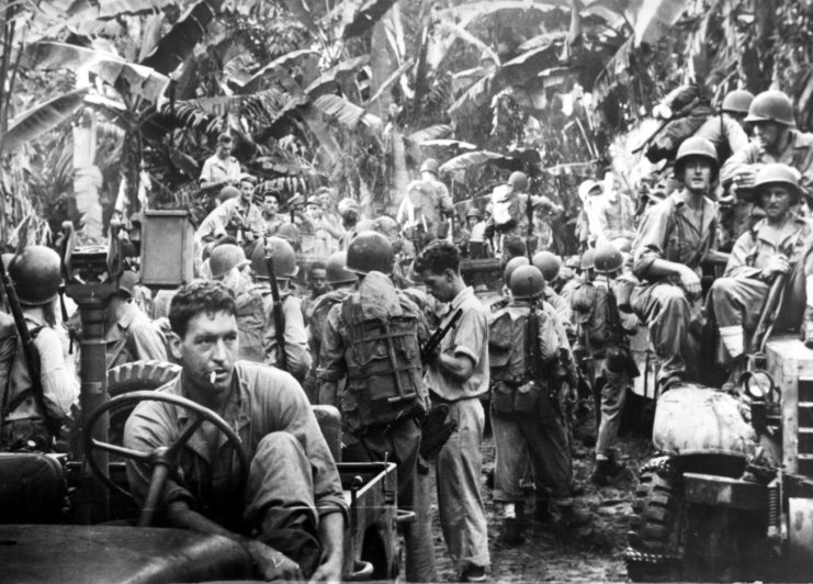 US infantry on Bougainville Island preparing to set out on a reconnaissance patrol against the Japanese during war in the Pacific. 