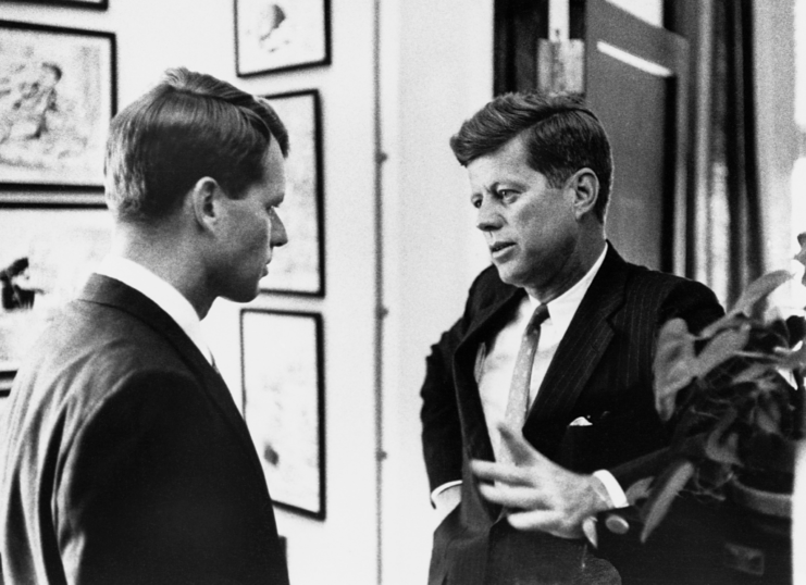Robert and John F. Kennedy speaking to each other