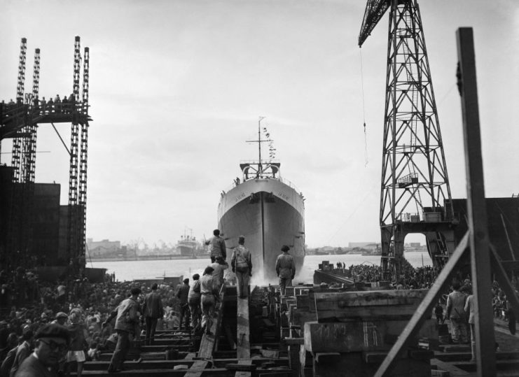 Workers attending the launch of La Seine at the Shipyards of France