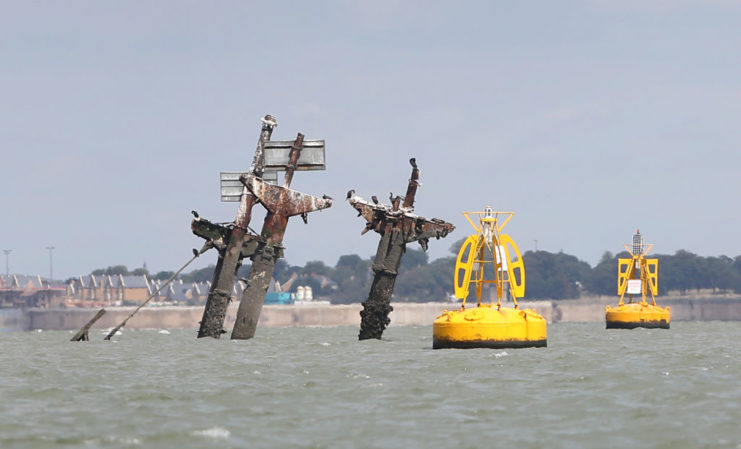 Two yellow buoys floating around the wreck of the SS Richard Montgomery