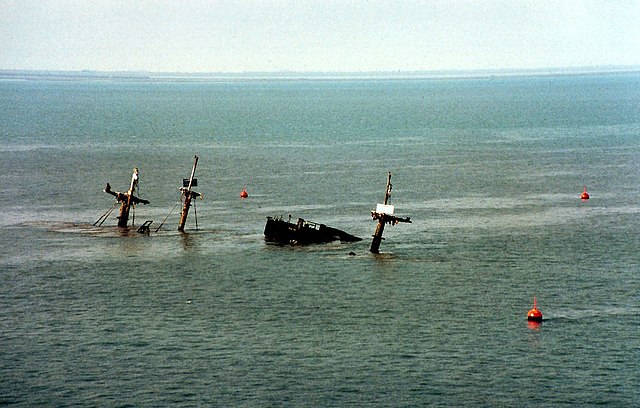 View of the partially-submerged wreckage of the SS Richard Montgomery