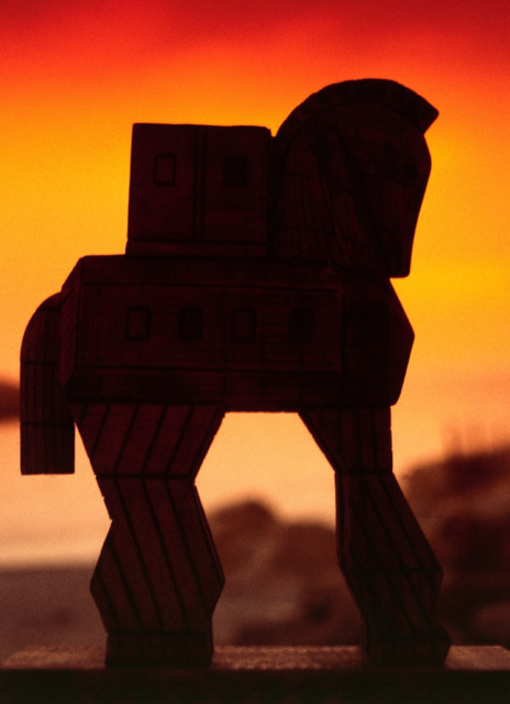 Silhouette of a Trojan Horse at sunset