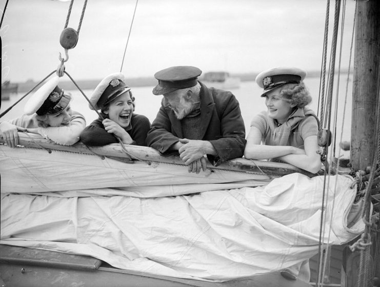William Kent speaking with three women on a boat