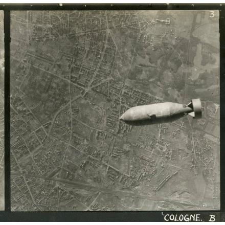 A bomb being dropped over a city