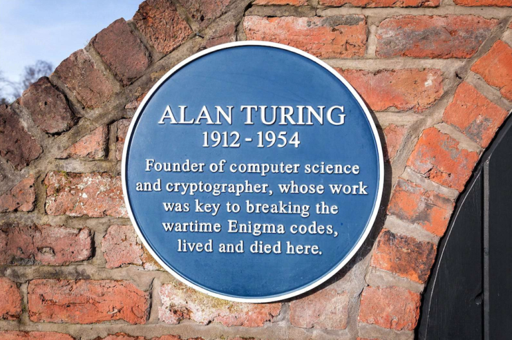 Blue plaque outside of the residence, explaining its historical significance