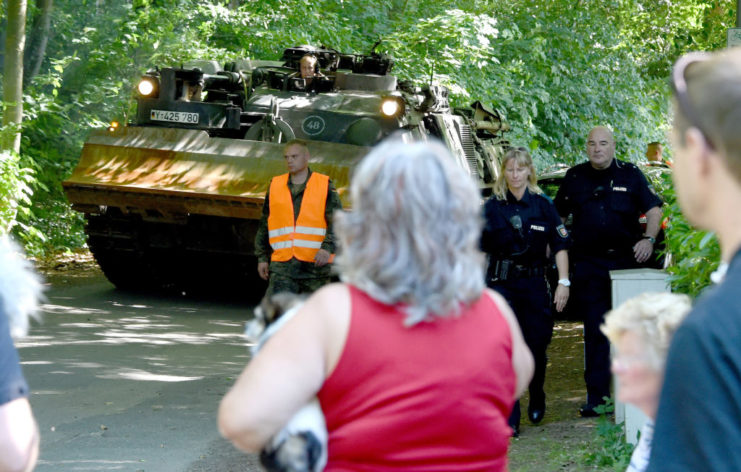 Crowd gathered to watch the 1943 Panther tank's removal