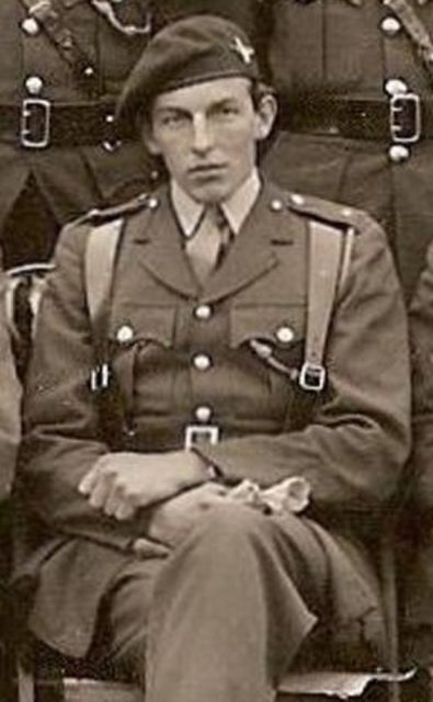 Cropped photo of Allison "Digby" Tatham-Warter sitting in uniform with his comrades