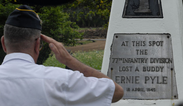 Soldier saluting the Ernie Pyle memorial on Ie Shima
